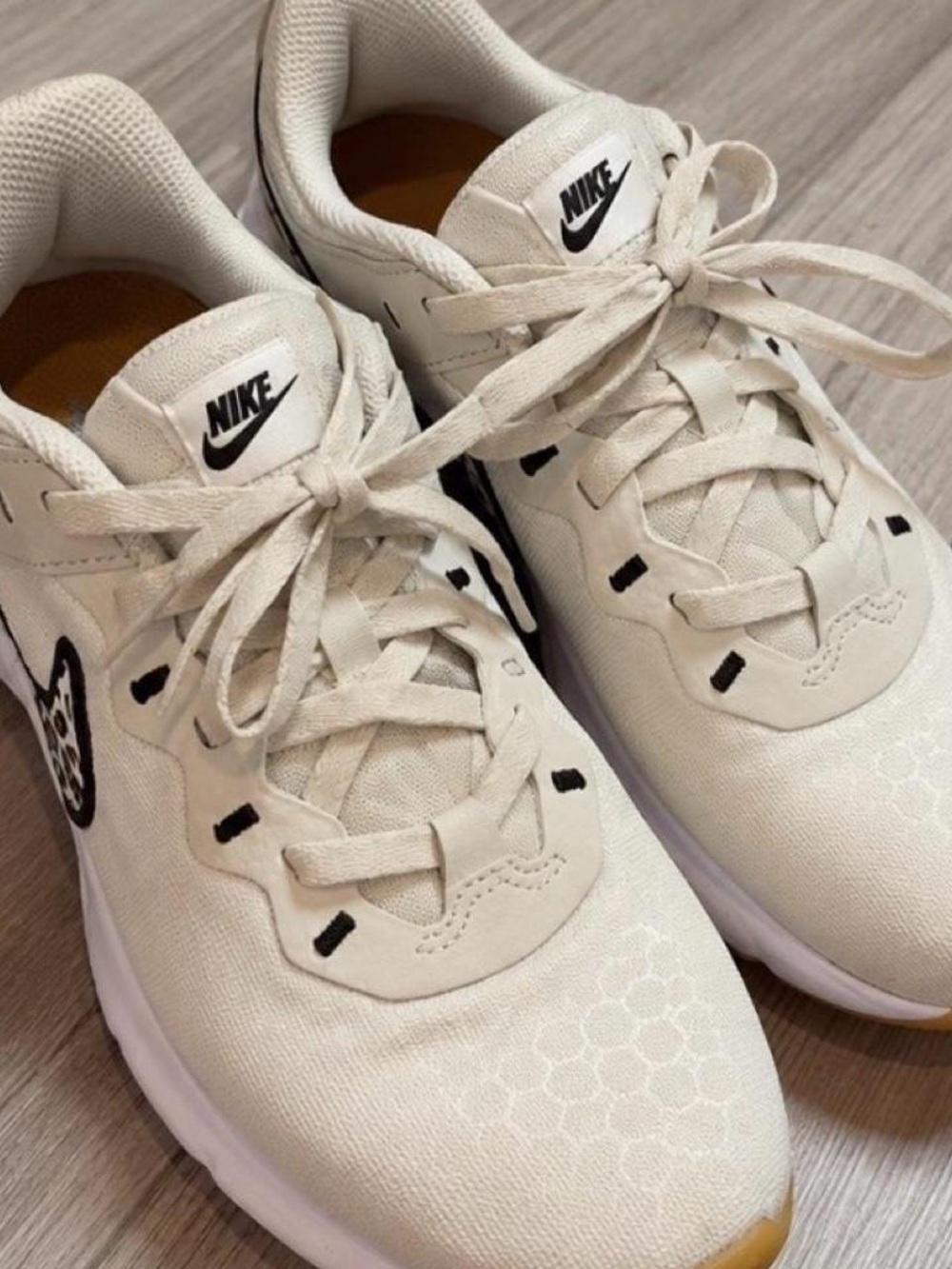 Nike Men’s Light Beige Athletic Sneakers with Black Accents